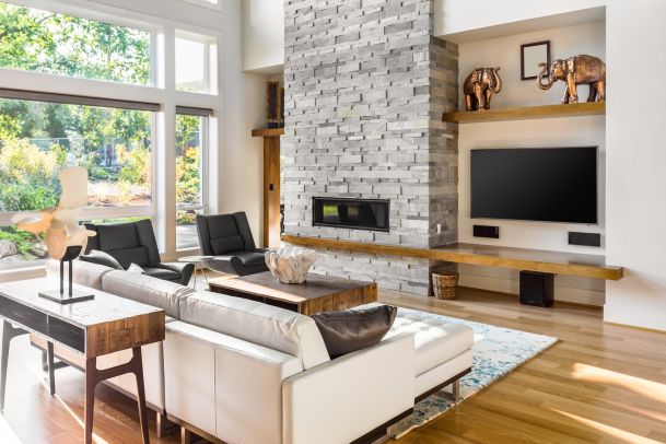 Living room with brick fireplace
